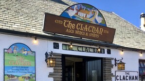 A building with a sign reading "The Clachan" and "ESTD 1734". - The Clachan Inn (Drymen)