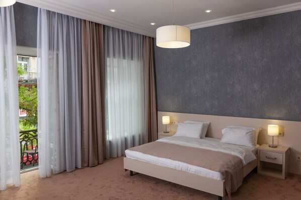 In-room safe, desk, blackout curtains, soundproofing