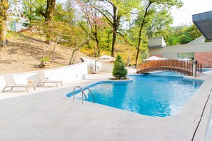 Indoor pool, seasonal outdoor pool, pool umbrellas, pool loungers