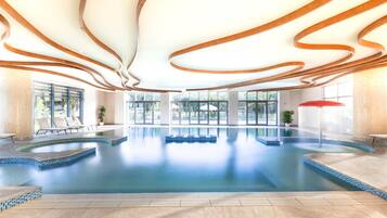Indoor pool, seasonal outdoor pool, pool umbrellas, pool loungers
