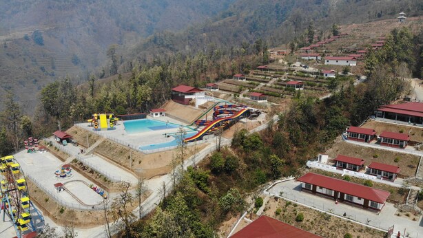 A resort with a pool, water slides, and a Ferris wheel. - Kabilas Resort and Funpark (Kabilas)