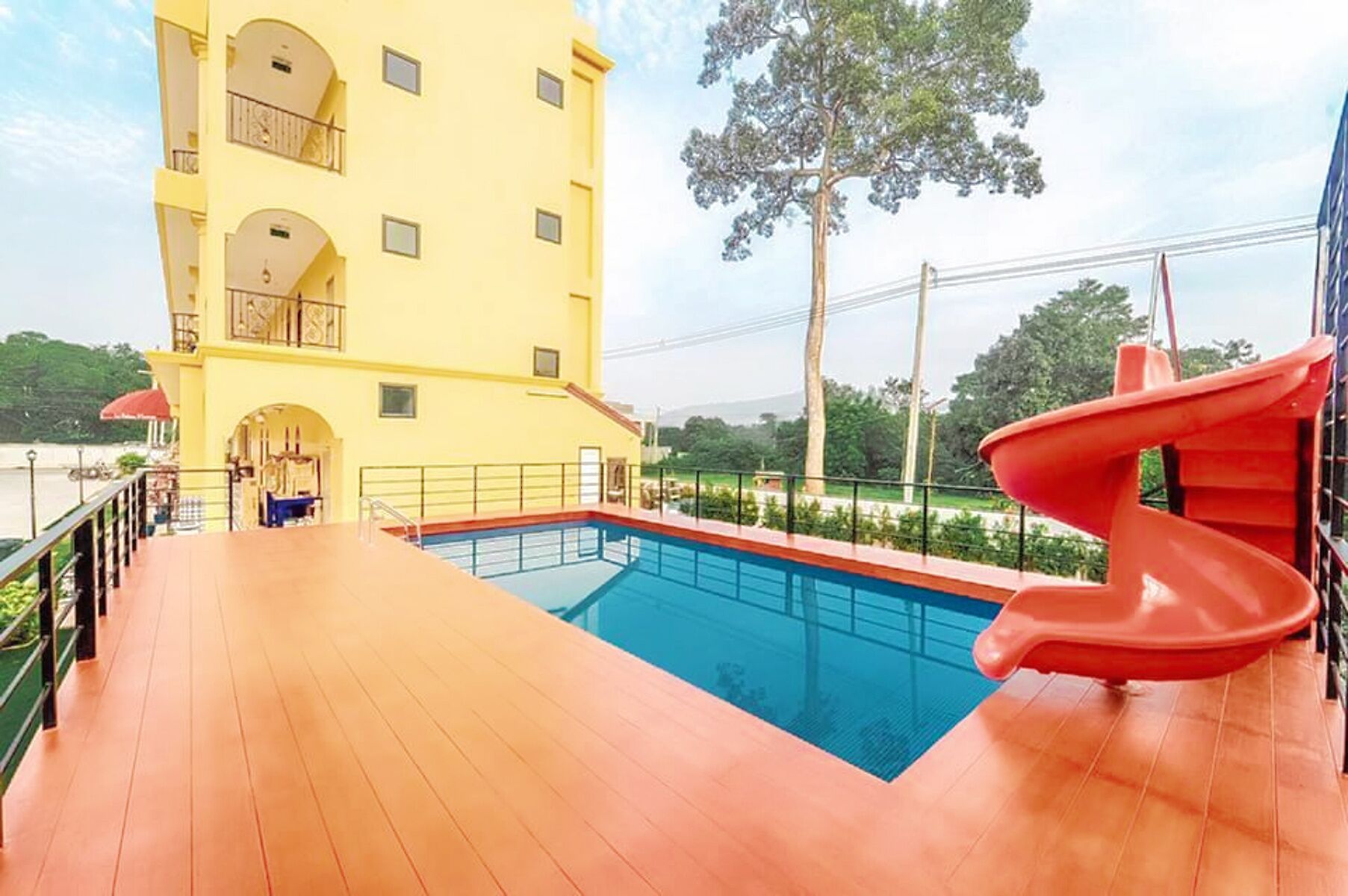 outdoor pool, open 6:00 am to 9:00 pm, pool umbrellas, pool loungers