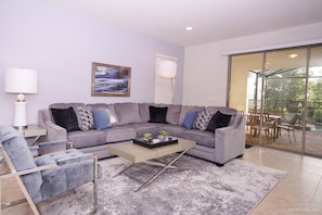 House, Multiple Beds | Living area | Flat-screen TV