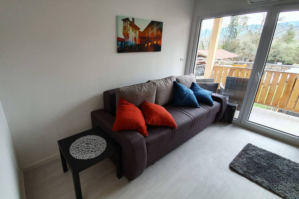 Deluxe Apartment, 1 King Bed with Sofa bed, Balcony, Garden View | Living room | 80-cm LED TV with satellite channels, TV
