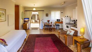 Cottage, Multiple Beds | Living area | Flat-screen TV, DVD player