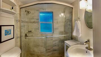 Shower, eco-friendly toiletries, hair dryer, bathrobes