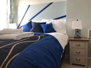 2 bedrooms, desk, iron/ironing board, travel crib