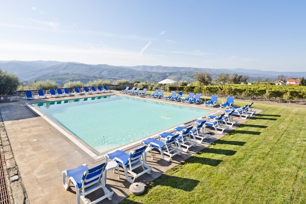 Seasonal outdoor pool, pool umbrellas
