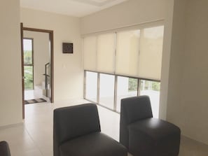 Apartment, 3 Bedrooms (A) | Living room | Smart TV