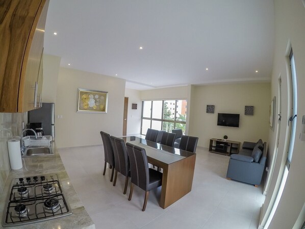 Apartment, 3 Bedrooms (A) | Living area | Smart TV