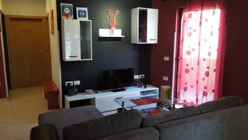 Vila, 2 quartos | Área de estar | TV de tela plana