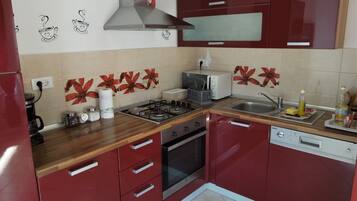 Villa, 2 Bedrooms | Private kitchen | Fridge, microwave, stovetop, dishwasher