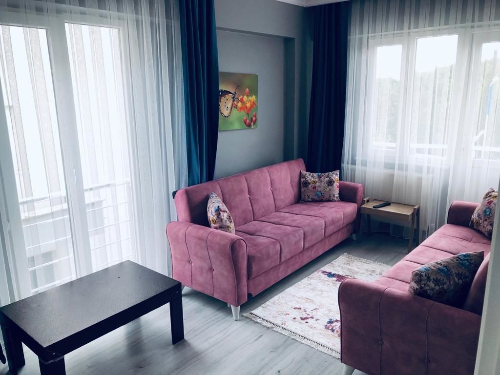 Appartement Classique, vue mer | Salle de séjour