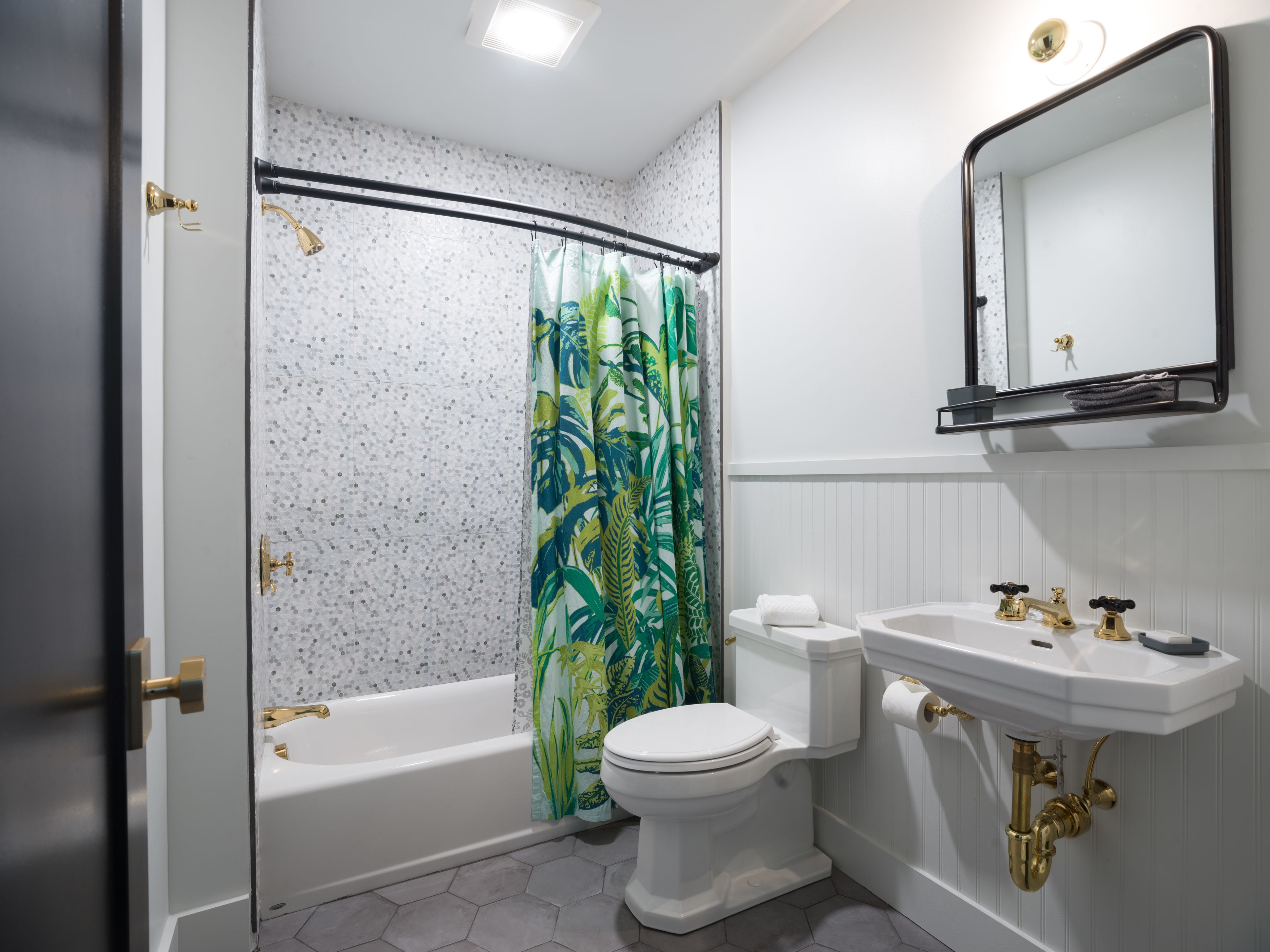 combined shower/bathtub, deep-soaking bathtub, designer toiletries