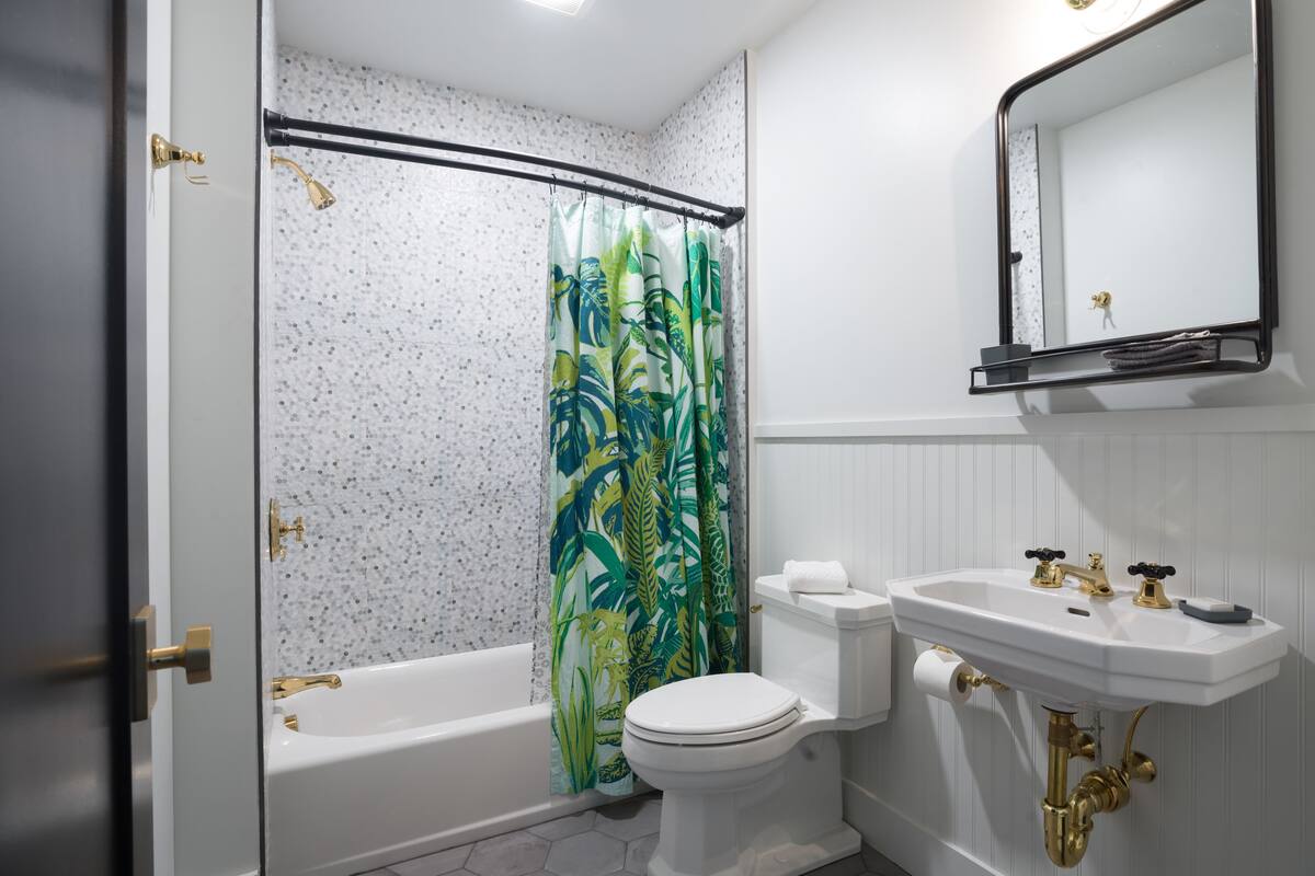 combined shower/bathtub, deep-soaking bathtub, designer toiletries