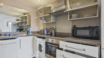 Executive Apartment, 1 Bedroom | Private kitchen | Full-sized fridge, microwave, oven, dishwasher