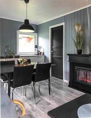 Mini-fridge, stovetop, electric kettle, cookware/dishes/utensils