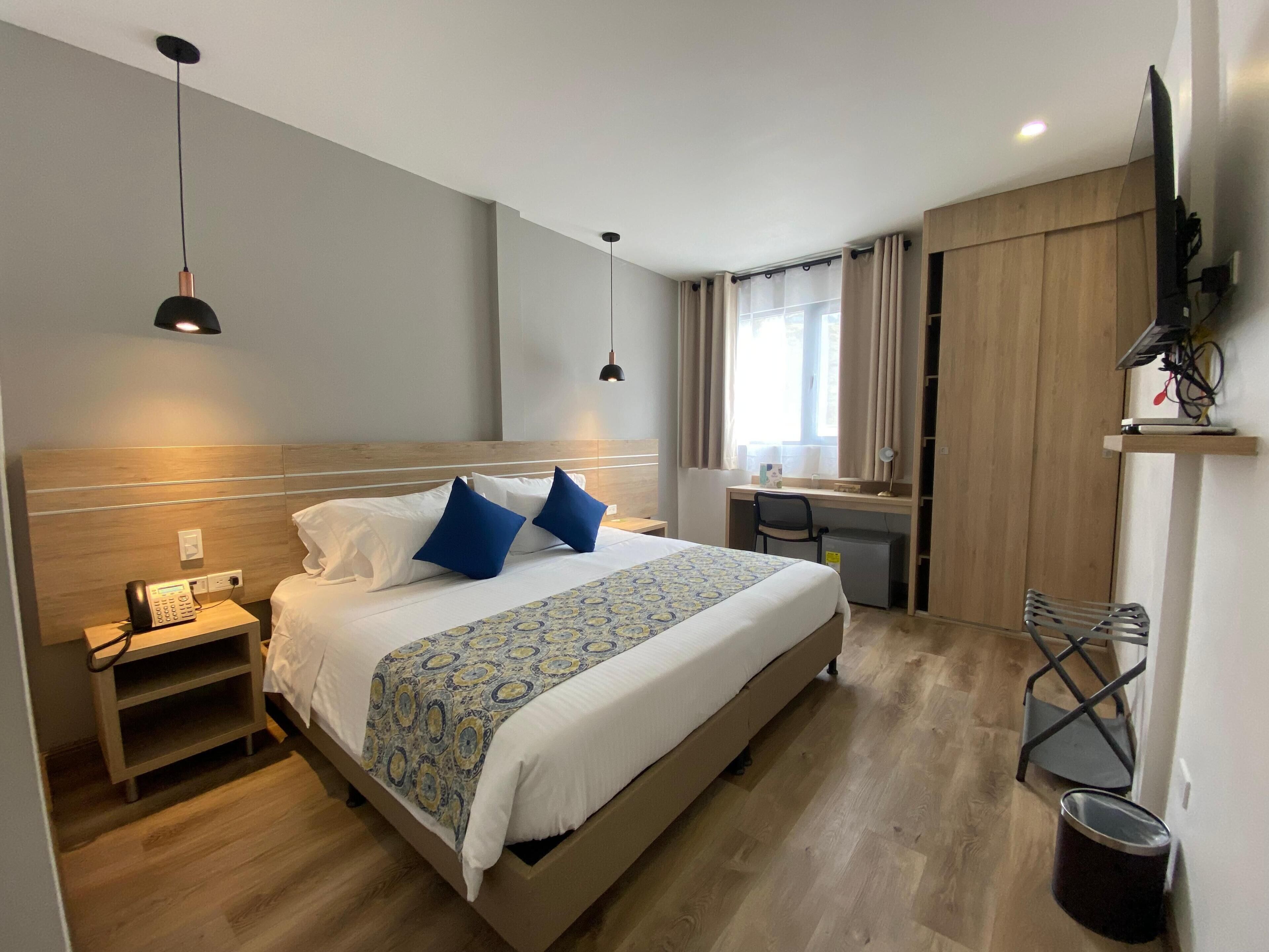 Premium bedding, down comforters, minibar, in-room safe