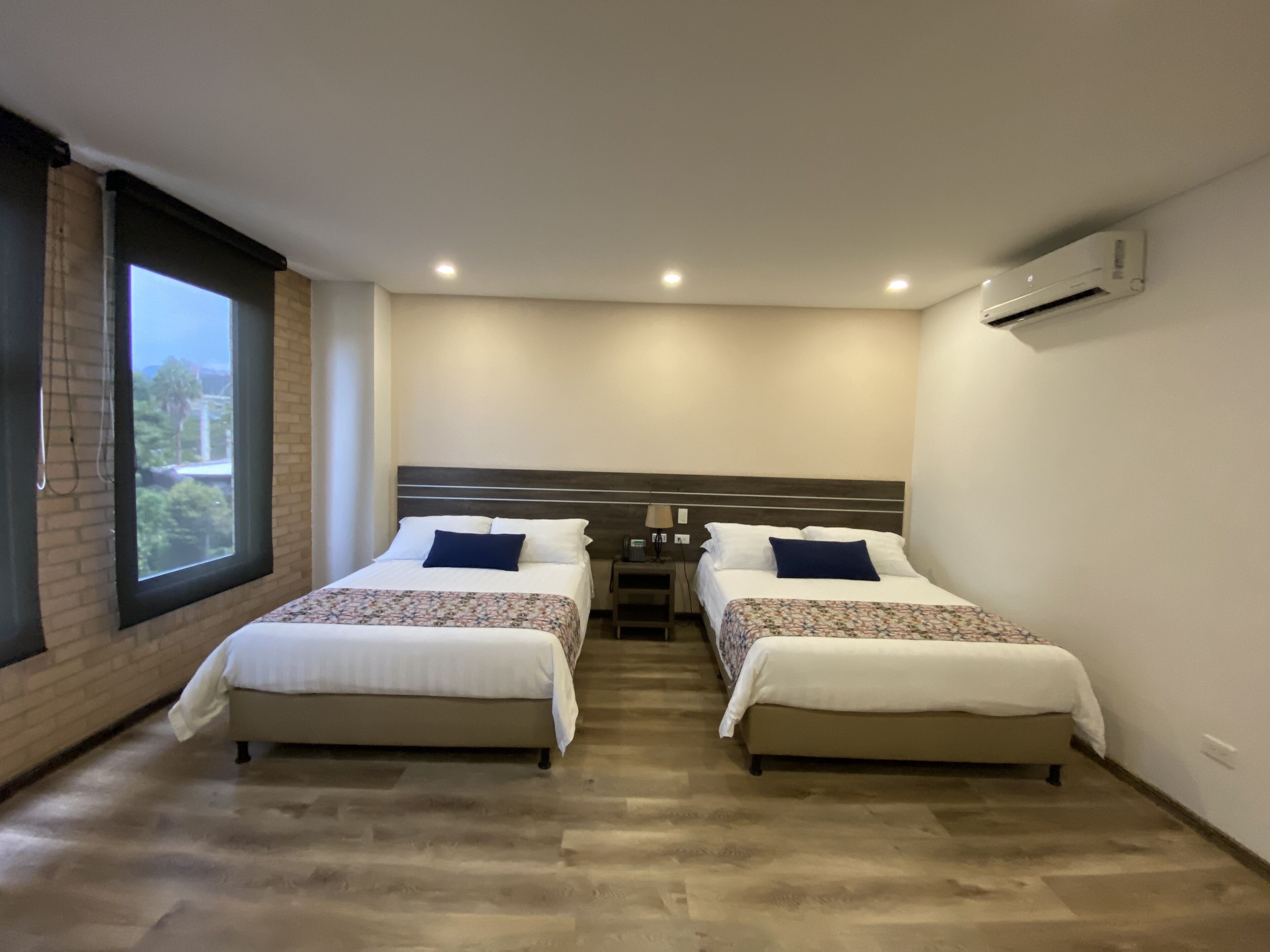 family room, 2 double beds | premium bedding, down duvets, minibar, in-room safe