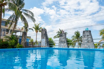 Cozy Studio/Room Enclosed on an Oceanfront Property at Mima´s Village Cozumel