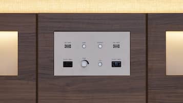 A control panel with USB ports, a power switch, and labeled sockets for AC100V and 5Amax.