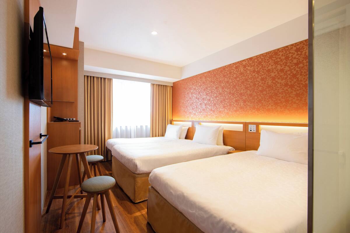 Blackout drapes, WiFi (free), bed sheets