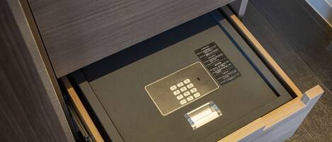 A drawer with a built-in lock and a card reader, likely for secure storage.