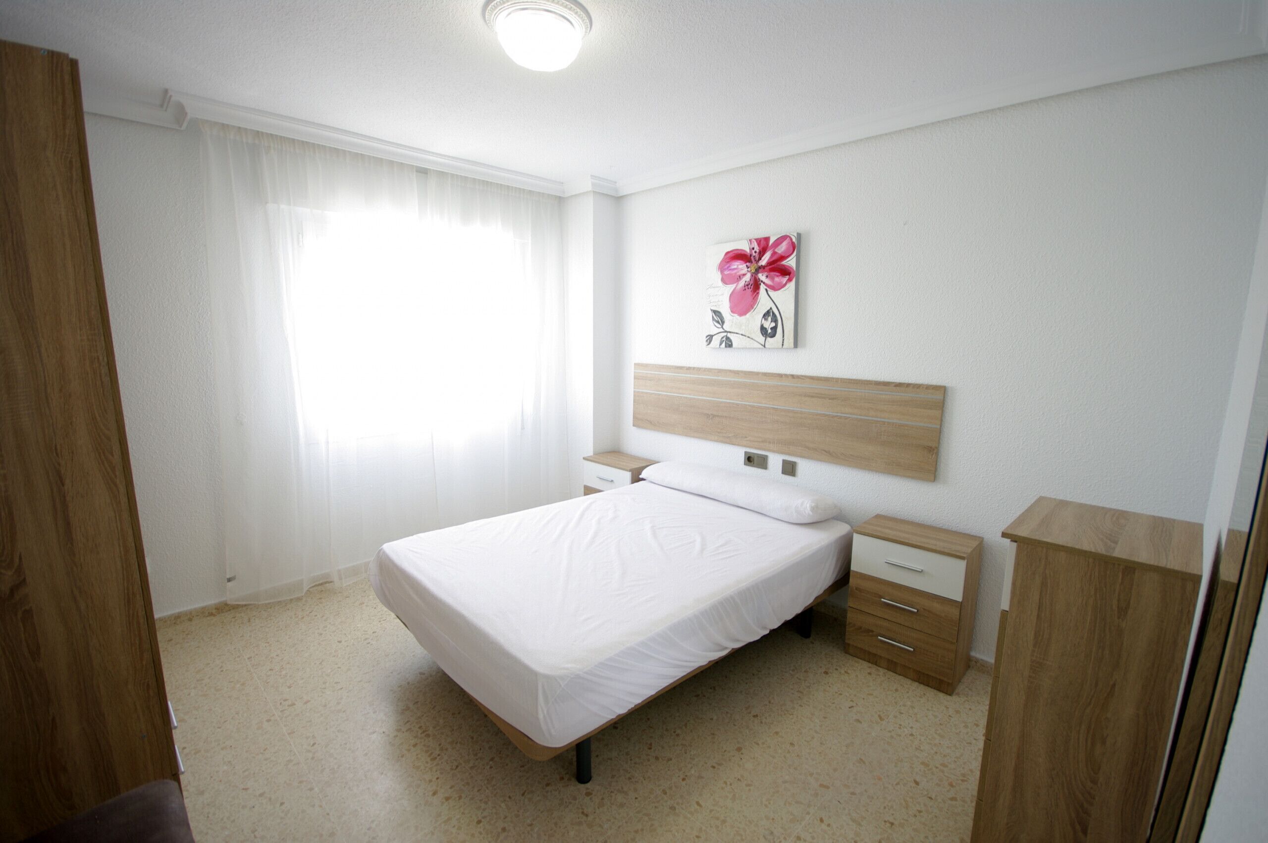 3 dormitorios, tabla de planchar con plancha, wifi gratis y ropa de cama