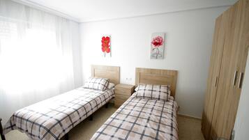 3 dormitorios, tabla de planchar con plancha, wifi gratis y ropa de cama