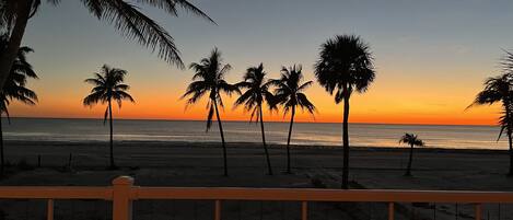 On the beach, sun loungers, beach towels