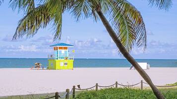 Enjoy a safe and scenic beach experience with a lifeguard station nearby.