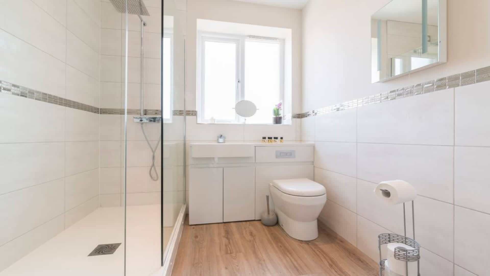 Shower, hair dryer, towels, shampoo