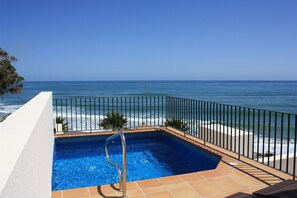 A rooftop pool, a heated pool