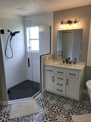 Bathtub, hair dryer, towels