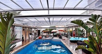 Unique winter heated / covered pool, open skies in summer, year round fun & swim