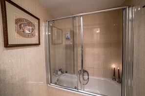 Bathtub, hair dryer, towels