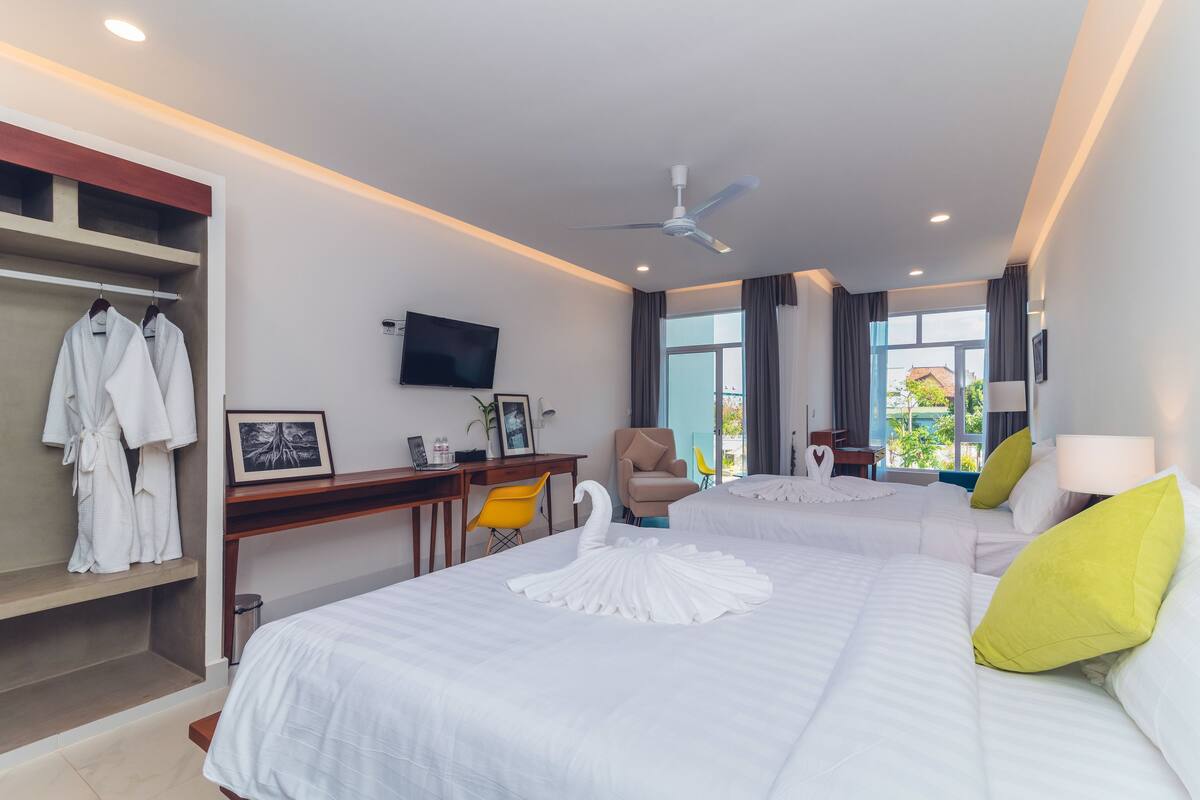 Habitación familiar (Deluxe) | Sábanas de algodón egipcio, ropa de cama de alta calidad y minibar