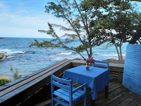 Outdoor dining. Low, Low Rate, Very Affordable Cottage on Private White Sand Beach