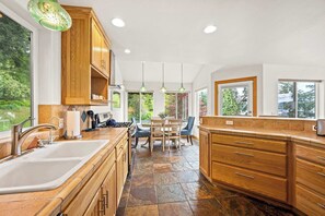 Fridge, microwave, oven, stovetop - Silver Beach Retreat|Lake Views w/ Hot tub! (Coeur d'Alene)