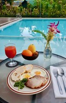 Outdoor pool, open 6:00 AM to 10:00 PM, sun loungers