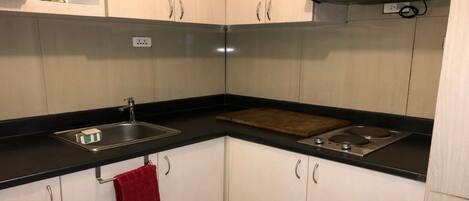 Fridge, microwave, stovetop, electric kettle