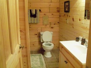 Combined shower/tub, towels, soap, toilet paper