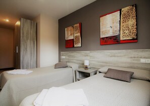 Desk, free WiFi, bed sheets