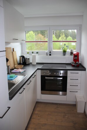 Design Apartment, City View | Private kitchen