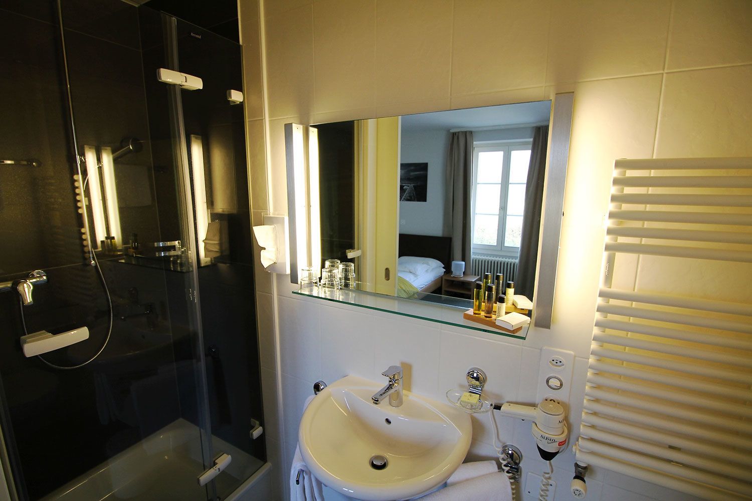 deluxe double room, 1 queen bed | bathroom | free toiletries, hair dryer, towels