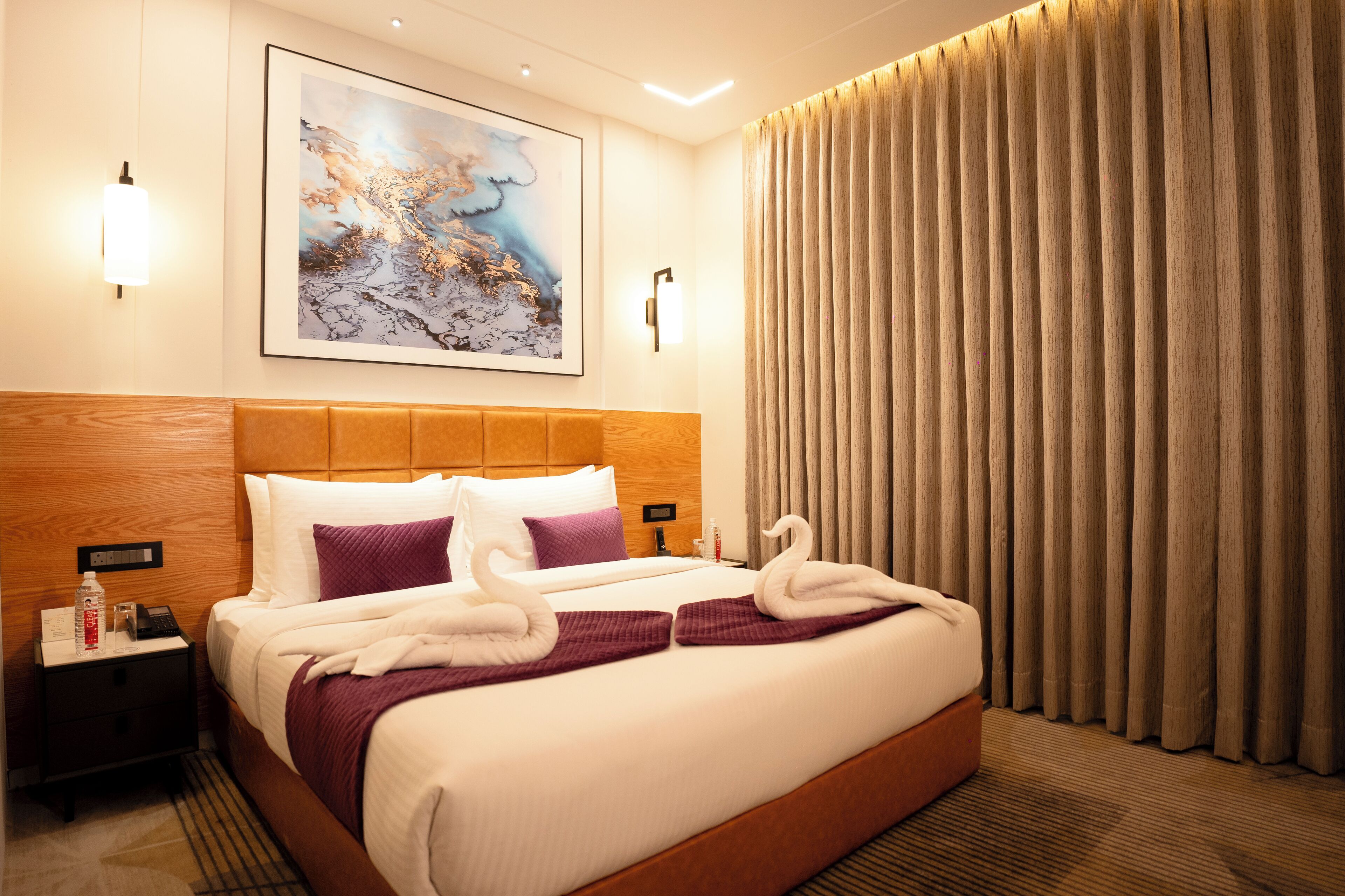 Premium bedding, down comforters, minibar, in-room safe