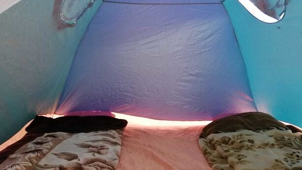 A tent with a blue interior and a pink floor. - Mars Private camp (Wadi Rum)