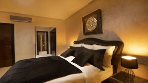 Departamento exclusivo, 2 habitaciones | 2 habitaciones, ropa de cama de alta calidad y camas Select Comfort