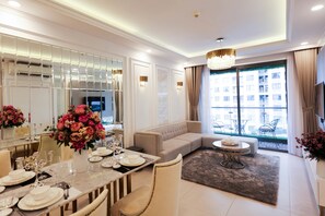 Deluxe Apartment, Pool View | Living area | Smart TV