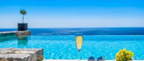 Outdoor pool, pool umbrellas, pool loungers